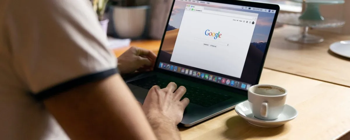 person using black laptop computer