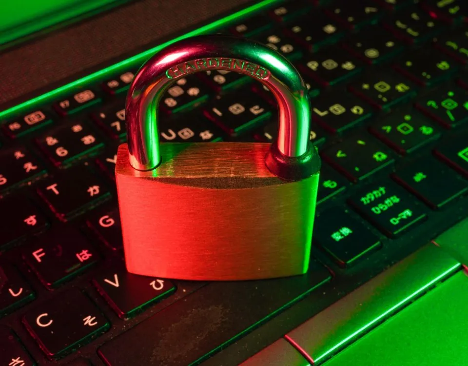 red padlock on black computer keyboard