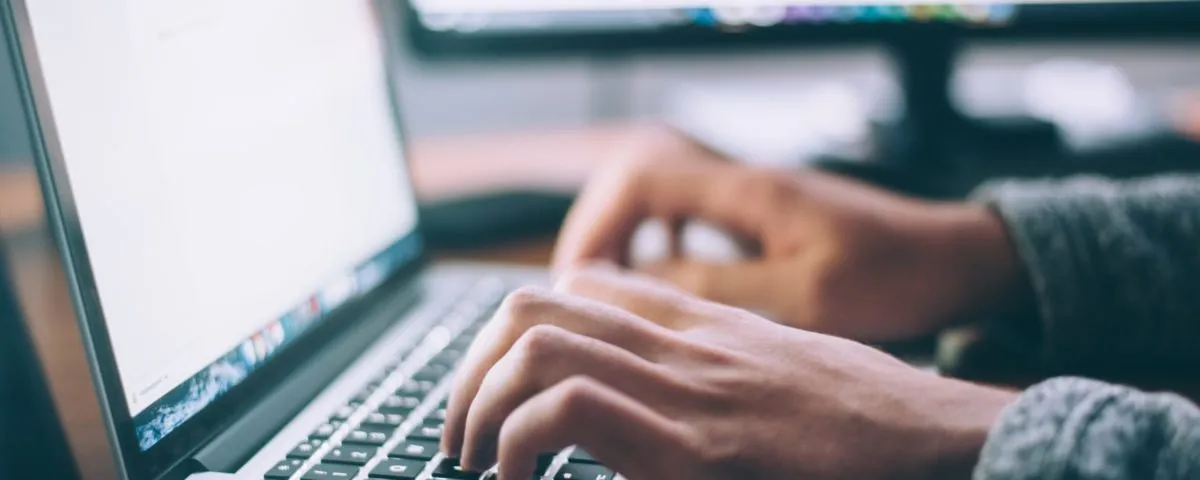 person using MacBook Pro