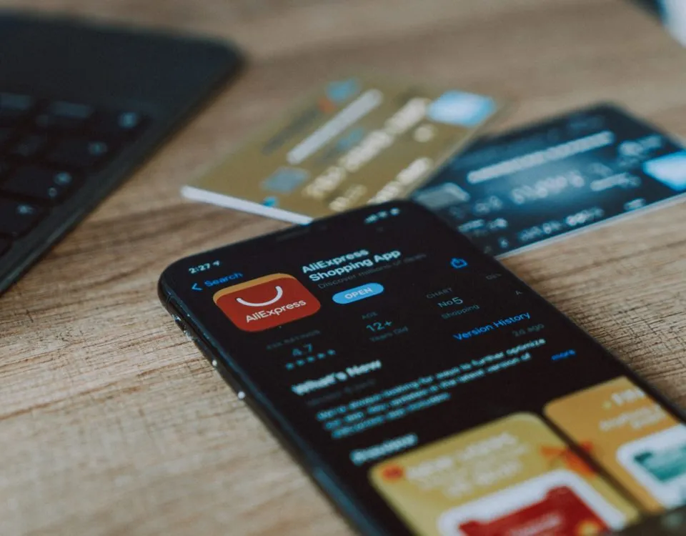 black and orange card on brown wooden table