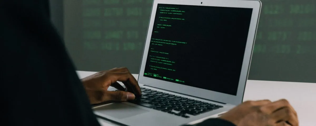 Free Person Using Macbook Air Stock Photo